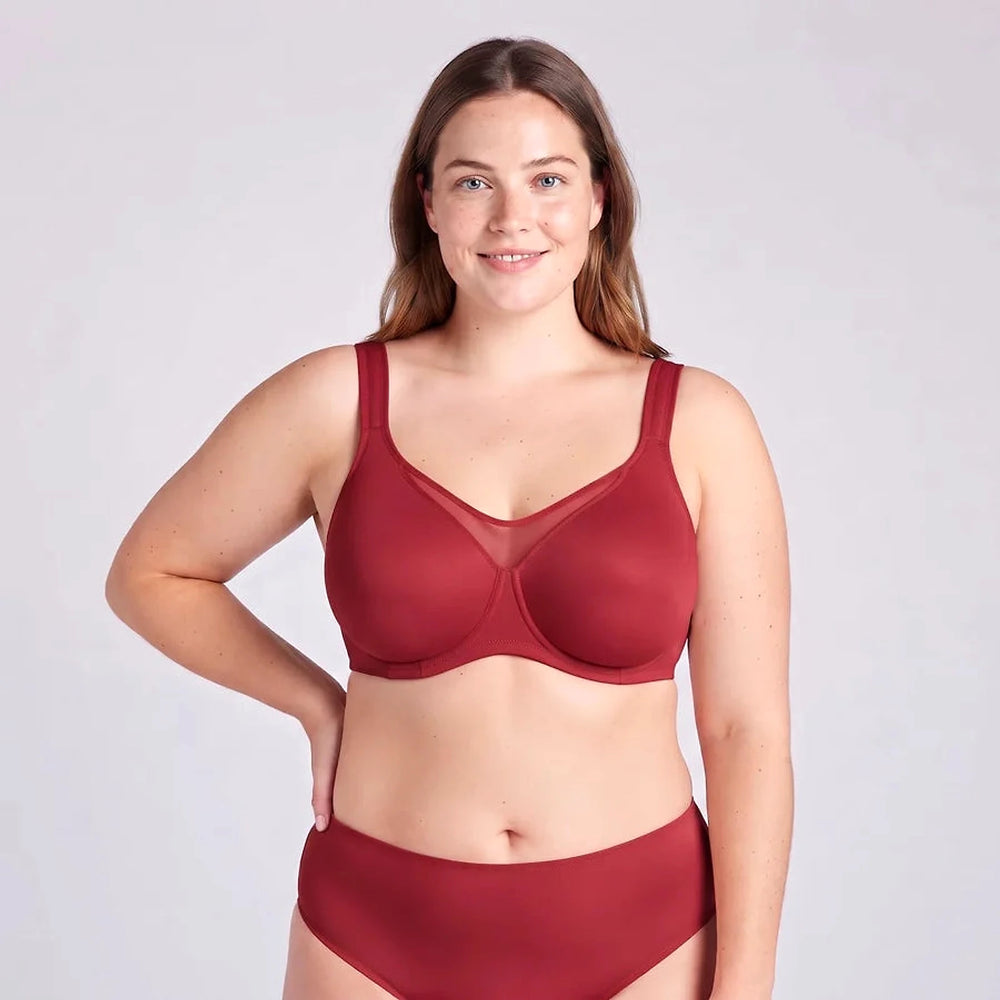 Lovelle Grace minimizer-BH i vinröd med hög mittpanel, på leende modell